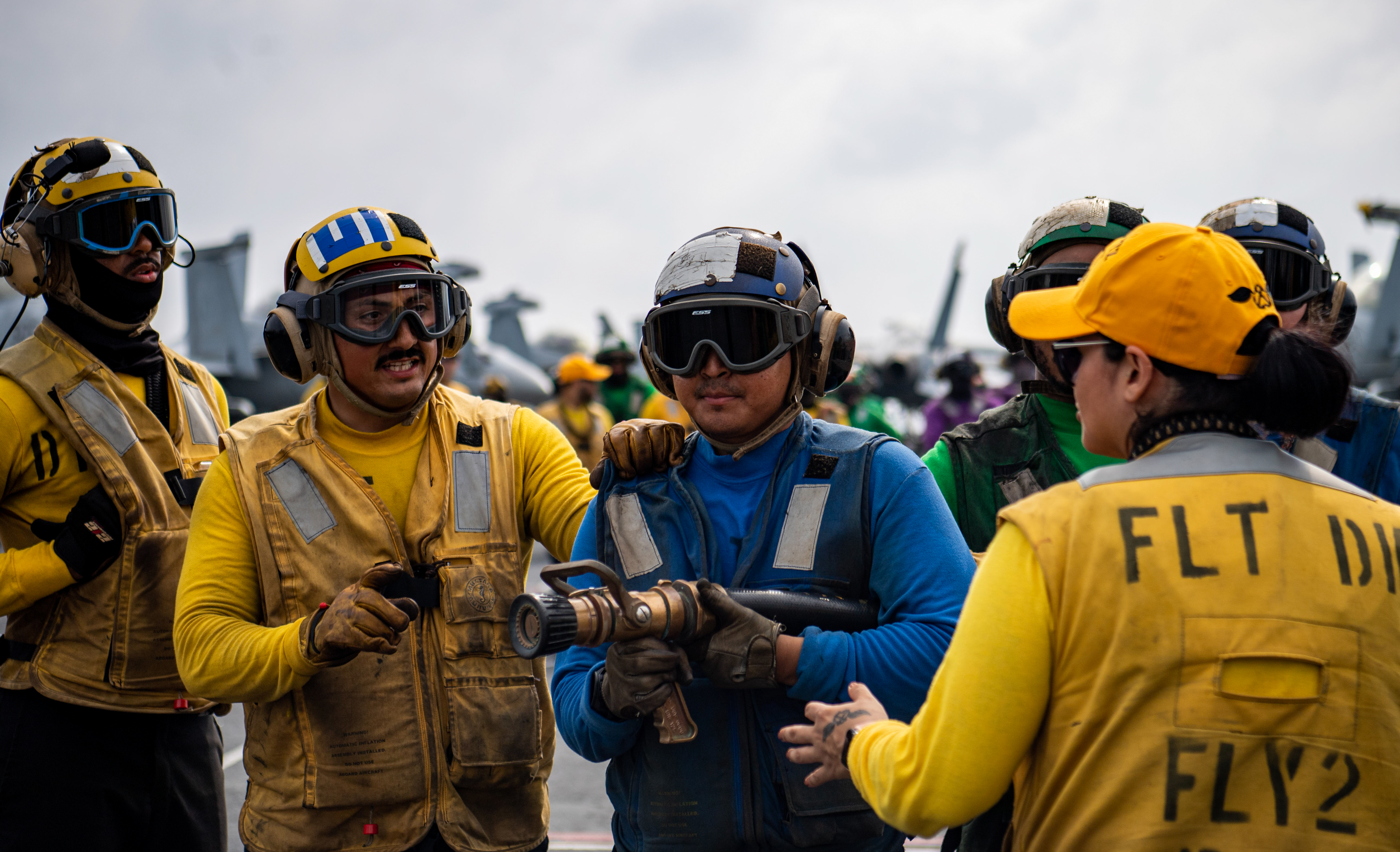 Sailors participate in mass casualty drill on flight deck of aircraft carrier USS Nimitz, South China Sea, February 6, 2023 (U.S. Navy/Kenneth Lagadi)